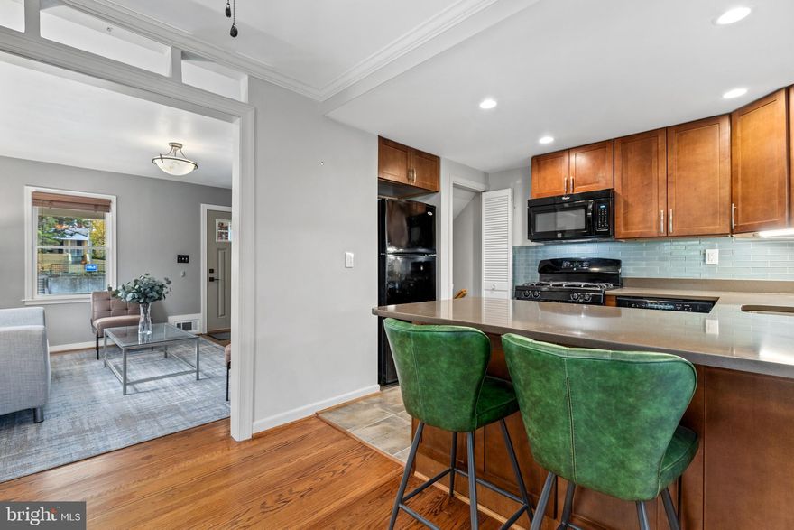 VA buyers have an AMAZING opportunity to assume an INCREDIBLY low rate of 2.375%!!! Don't miss the opportunity to own this exquisite brick duplex townhome in the sought-after Jefferson Manor neighborhood. Boasting a spacious lot with an extended driveway, this home offers the perfect blend of charm and modern updates. As you step inside, you'll immediately notice the elegant hardwood floors that gracefully flow throughout the first two levels, creating a warm and inviting ambiance. The main level is a true showstopper, featuring an updated kitchen with a delightful open layout. The kitchen is equipped with sleek shaker cabinets, quartz countertops, and modern appliances, making it a chef's dream and a perfect space for hosting friends and family. Moving to the upper level, you'll discover two well-appointed bedrooms, offering cozy retreats after a long day. A full bathroom on this level ensures convenience for all residents and guests. Additionally, the basement, with its convenient walk-up access, provides extra living space and includes another full bathroom, perfect for a variety of uses such as a home office, guest suite, or entertainment area. One of the standout features of this home is its lack of HOA fees, allowing you the freedom to make this property truly your own. Beyond the confines of this charming home, you'll find that it's ideally situated for easy commuting and access to all the amenities the area has to offer. The Huntington Metro Station, I-495, Rt 1, Rt 241, Old Town Alexandria, and downtown DC are all within easy reach, making this an excellent location for those who want to enjoy the best of the DMV area. This is an opportunity you won't want to miss. Schedule your visit today to experience this remarkable Jefferson Manor townhome for yourself, and imagine the possibilities it holds for your future.