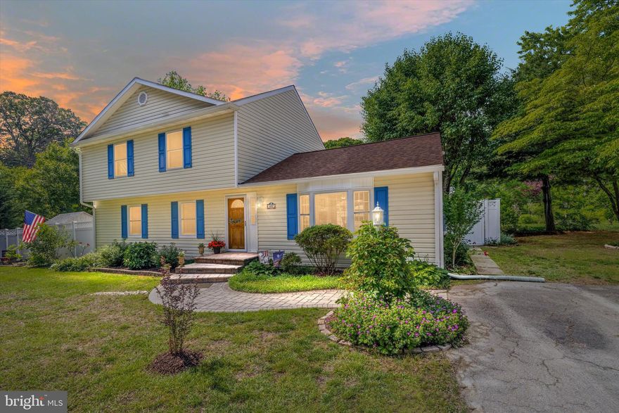 Some Severna Park homes check all the boxes on paper. This one actually delivers. 607 Amoss Road not only provides water amenities that are going to feel extra good this summer, but there are also amazing water views from inside the home! 
Inside, the kitchen has been fully redone and it shows: white shaker cabinets, stainless appliances, a center island with granite, tile backsplash, pendant lighting, and a built-in butler's pantry/coffee bar that makes morning routines more luxurious. The main floor offers an option for an office/den or a bedroom and another huge room with a full bathroom that can be used as a family room or first floor primary. 
Upstairs, you will find 3 bedrooms and a full bathroom. And, this matters more than people admit, the laundry is upstairs too. No hauling baskets up and down stairs.
Now the backyard. It's the kind of private you don't stumble into by accident. Fully fenced with a composite deck, hot tub, paver patio, a little pond with a waterfall, mature trees, and 2 sheds. Whether you're entertaining or just unwinding after a long week, this space earns its keep.
Severna Park schools, easy access to 50 and Route 2, walk to the B&A Trail, and water access practically in your front yard. This one is move-in ready and summer-ready at the same time — that combination doesn't last long.