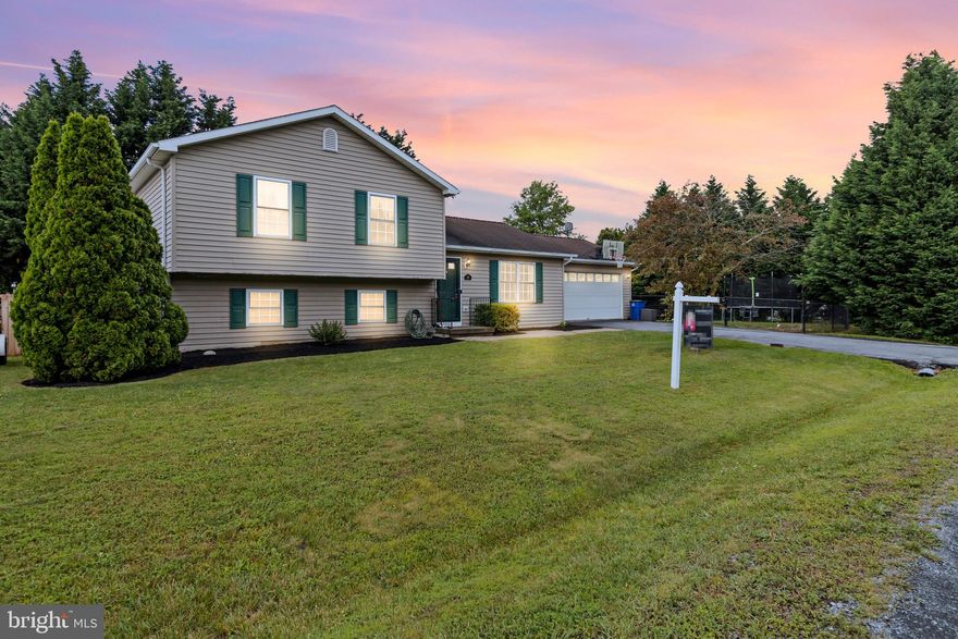 Welcome to this inviting 3-bedroom, 2-bathroom split-level home, perfectly situated on a desirable corner lot. This residence boasts lots of features designed for comfort and convenience, making it an ideal place to call home.  Three well-appointed bedrooms offer ample space for family, guests, or a home office, and two full bathrooms.  Enjoy the unique layout that offers a seamless flow between living spaces. Perfect for families, pets, or private gatherings, the fenced yard ensures safety and privacy.  Step outside to a spacious, lovely deck, ideal for relaxing or entertaining while overlooking the backyard.  A versatile finished basement adds additional living space, perfect for a recreation room, office, home gym, 4th bedroom or extra storage.   Mature privacy trees surround the property, creating a peaceful and secluded environment.  Located in a friendly neighborhood with easy access to schools, parks, shopping, and dining, this home offers the perfect blend of suburban tranquility and modern convenience. Don't miss the opportunity to make this charming property your own! Schedule a showing today and envision the possibilities of life in this beautiful home. The basketball hoop, trampoline, and awning do convey!!