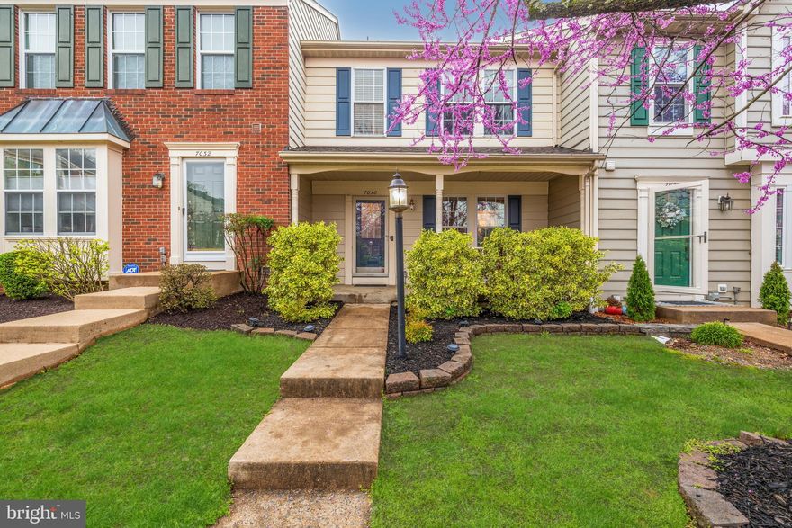 Welcome to 7030 Gatton Square, an outstanding Stanton model backing to woods in Alexandria’s desirable Manchester Lakes.  A covered front porch and curved planting bed give this home great curb appeal. Inside, there are hardwood floors, dentil and crown molding in the foyer and living room. Brand new carpeting has been installed on the upper level and other upgrades include the HVAC (2020), water heater (2020) and the roof (2018). Throughout, you’ll notice the brushed-nickel door knobs and hinges. The tastefully updated eat-in kitchen features stainless appliances, granite counters, modern cabinetry with brushed nickel hardware, updated light fixture, double-sink with swan-neck faucet and ceramic tile flooring. It walks out to the terrific deck overlooking a gorgeous view of  treed woodlands - an ideal spot for gathering with family and friends! The cheerful living room offers beautiful hardwood floors and elegant crown molding plus a granite-topped pass-thru with shelving to the kitchen. There are some stylish updates in all the bathrooms. Upstairs, a high cathedral ceiling and contemporary light fixture add a feeling of spaciousness. All three bedrooms have lofty vaulted ceilings and two have ceiling fans. The owner’s suite has a walk-in closet. On the lower level, you’ll find the good-sized laundry/storage room, second powder room and the wonderful rec room with its cozy fireplace with slate surround and a detailed wood mantel illuminated by eye-ball lights. It leads out to the beautiful paver patio and fully fenced-in rear grounds. Be sure to take care of all Manchester Lakes’ many amenities like the pool, exercise room, sports courts and walking paths. This fine residence is super-close to two town centers, Metro, all commuter routes, Wegmans and more!
