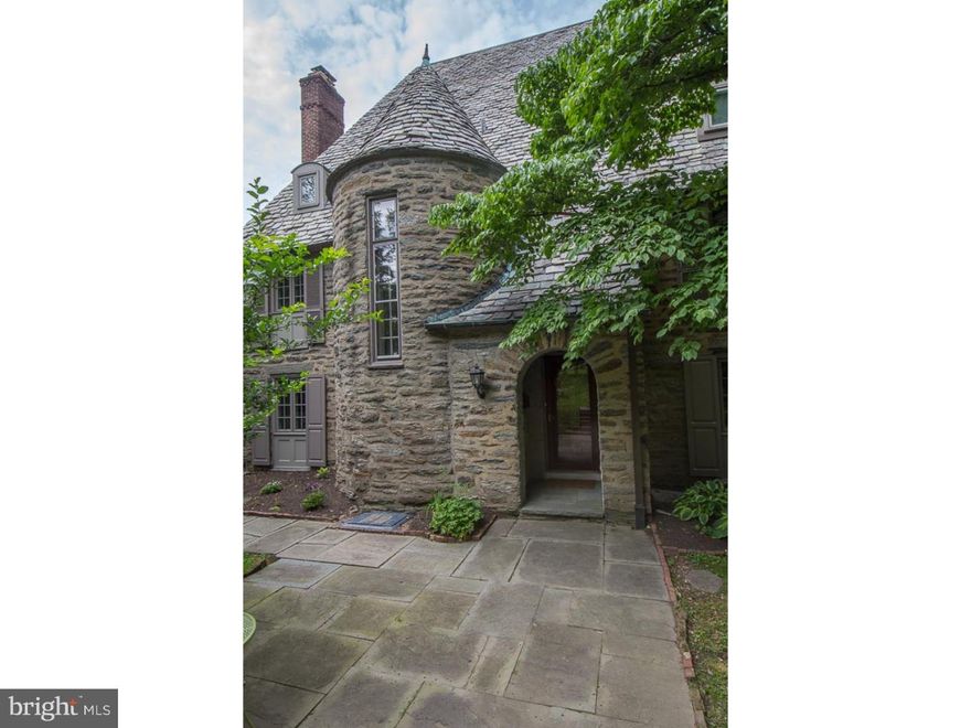 A rare opportunity to live on a small private lane in the quaint, coveted French Village section of Mt Airy. The French Norman style home was commissioned by famed developer George Woodward and built by renowned architect Robert McGoodwin and backs up to Fairmont park. This house is filled with architectural detail and charm, notably 3 fireplaces, a dining room with a Mercer tile floor, and a gracious turned stairway. A flagstone patio and covered  porch offer views of the pool, gardens, and Fairmont Park. These spaces provide ample room for outdoor entertaining.  A master bedroom suite has a large, updated bath and dressing room. There are Two additional bedrooms and a hall bath on this level. The third floor has three more generously sized bedrooms and another hall bath.  A large separate 2 car garage with pool house provides extra space for storage.  Elbow lane is a private road, water and sewer serviced by the city of Philadelphia.