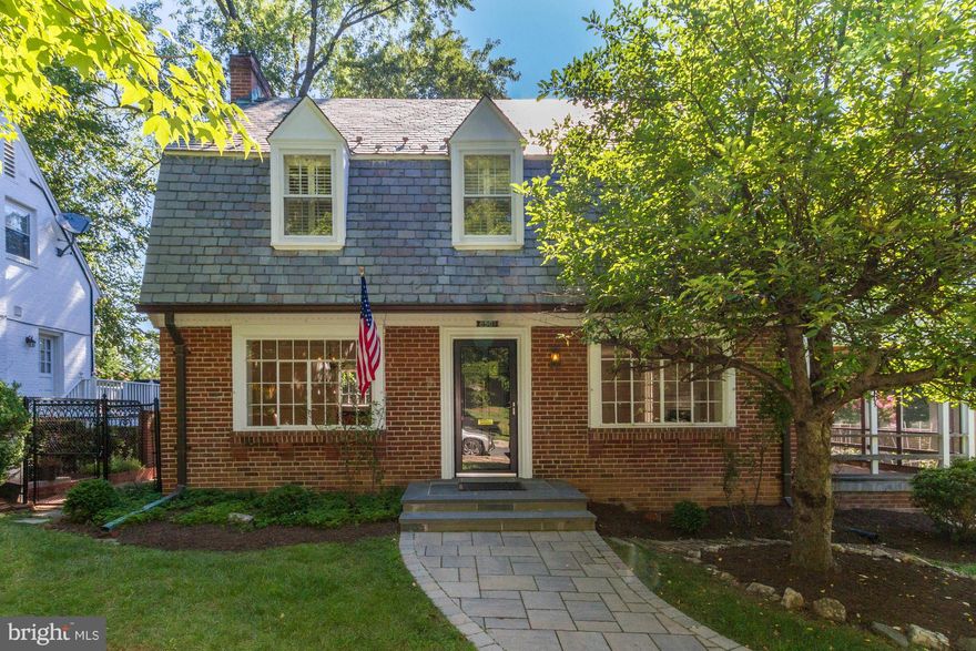 3BR, 2.5BA, LL rec room - brick Dutch Colonial w. rear alley access, front street parking + easy access to Beltway and DC. Unique screen porch for dining. Adjoining deck overlooking gardens. Lot provides house expansion. Multiple window shutters provide privacy.  Ref. hardwood floors, and new gas insert fireplaces. Kitchen feat. maple cabinets, granite counters, Thermador range and ss appliances.