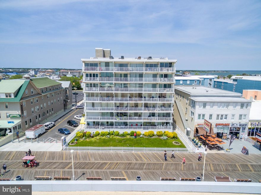 "THIS IS A MUST SEE PROPERTY"!DIRECT OCEANFRONT ON THE BOARDWALK! Enjoy unobstructed panoramic views of the Beach, Ocean and Boardwalk from this top floor north end unit! This fabulous 2 story unit has been beautifully updated and features ceramic tile, upgraded kitchen cabinets, granite counter tops, totally remodeled baths, custom paint, and extra side windows that brighten up the entire unit and expand the views! The private oceanfront balcony overlooks the beach and boardwalk and the private bayside balcony features bay views and beautiful sunsets. You can take the elevator down to walk out to the boardwalk and beach or to relax at the outdoor pool. THIS IS THE PRETTIEST EL CAPITAN UNIT WE HAVE EVER SEEN ! Do not pass up this opportunity to own on boardwalk in Ocean City!
