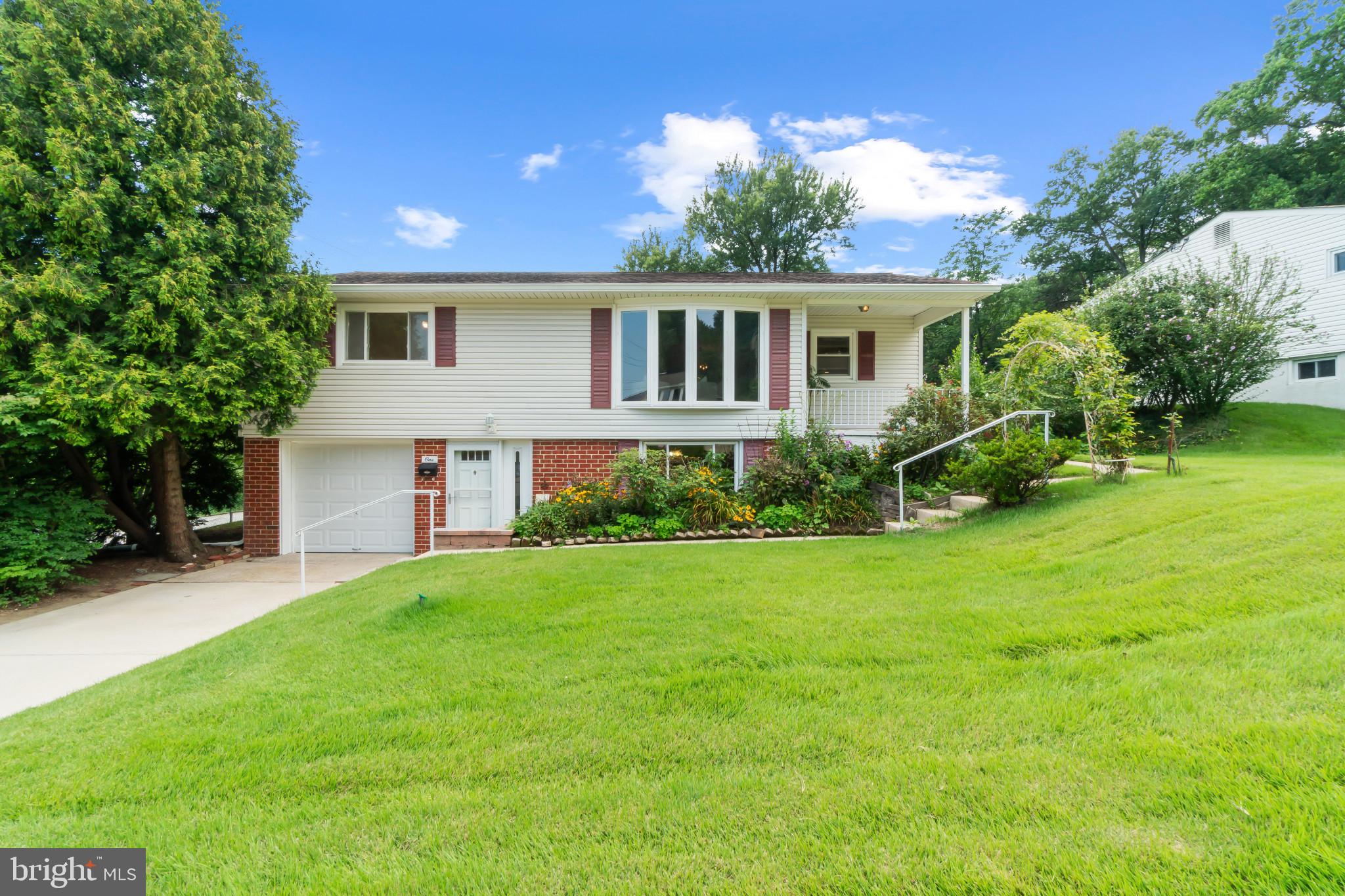 Welcome to this delightful three-bedroom, one-and-a-half-bathroom home nestled in the charming Hillside Acres community. This well-maintained residence sits on a corner lot, offering both privacy and space with its completely fenced-in yard that's refreshingly flat – perfect for outdoor activities.
Step inside to discover beautiful hardwood floors that flow throughout the home, recently enhanced with fresh paint that brightens every corner. The thoughtful layout maximizes the 2,148 square feet of living space, creating an inviting atmosphere for both daily life and entertaining guests.
The fully finished basement adds tremendous value, essentially doubling your living space with endless possibilities for recreation, hobbies, or a home office. Upstairs, you'll find a bright sunroom that serves as the perfect morning coffee spot or reading nook, where natural light pours in to create a cheerful retreat.
Practical amenities include a convenient one-car garage for protected parking and storage. The location offers excellent connectivity with North County High School nearby for families, while commuters will appreciate proximity to BWI Thurgood Marshall station and light rail access. Daily conveniences are well-covered with grocery options and Southwest Area Park providing recreational opportunities.
This home strikes that sweet spot between comfortable living and practical functionality. The combination of move-in ready condition, desirable lot characteristics, and thoughtful features like the finished basement and sunroom make this property an excellent choice for buyers seeking both comfort and value in a well-established neighborhood.