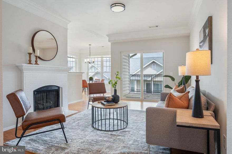 Top floor (penthouse) corner location, beautifully updated, and convenient in so many ways… you’ll love this Gates of McLean condo! The unit has 2 bedrooms, 2 baths, and open plan living space with natural light pouring in from both sides. There’s a sizeable deck, which, facing the interior of the community, is quiet, buffered from the hustle and bustle of the Tysons area. The Living Room features a gas fireplace, hardwoods, new stylish lighting, and sliders to balcony. The dining room occupies the corner of the unit, drenched in light from large windows with new blinds. The main area hardwoods transition to new luxury vinyl plank (LVP) in the kitchen that features a new microwave, granite counters, and newly re-faced white cabinets.  Both large bedrooms – situated on opposite sides of the unit for privacy - have walk-in closets, ceiling fans and brand new carpet. The primary bedroom, with a bay window, has an en-suite bath and the second full bath is situated in the hall, just outside the second bedroom.  Both bathrooms have new, LVP flooring and new lighting. The laundry room is across the hall from the second bedroom, with the same new LVP flooring as the baths. Updates include HVAC (2024), Hot Water Heater ( 2023), Refrigerator ( 2022), Range ( 2020).  This unit comes 1 assigned/reserved parking space and two parking passes. The community boasts resort-style amenities including pool, sauna, basketball court, fitness center, picnic/BBQ areas, theatre room, and clubhouse lounge. The grounds are impeccably landscaped and maintained, and there’s a community portal to message other residents. The condo fee includes all amenities plus common area maintenance, exterior building maintenance (power washing in process, including the siding around your deck!), management, reserve funds, parking, road maintenance, snow removal, trash and water.  If you have an electric vehicle, there’s an EV charging area with discounted fees for residents. Pets are allowed with fees based on size. The community is two blocks to the McLean Station Metro or bus stop and one block from Wegmans. It’s walkable to some terrific restaurants as well as the Capital One Hall, a wonderful new performance theatre! All the shopping and conveniences of Tysons Corner are minutes away. And when it’s time to commute by car or get out of town, there’s super easy access to I-495, I-66, Route 123, Route 7, and the Dulles Toll Road.