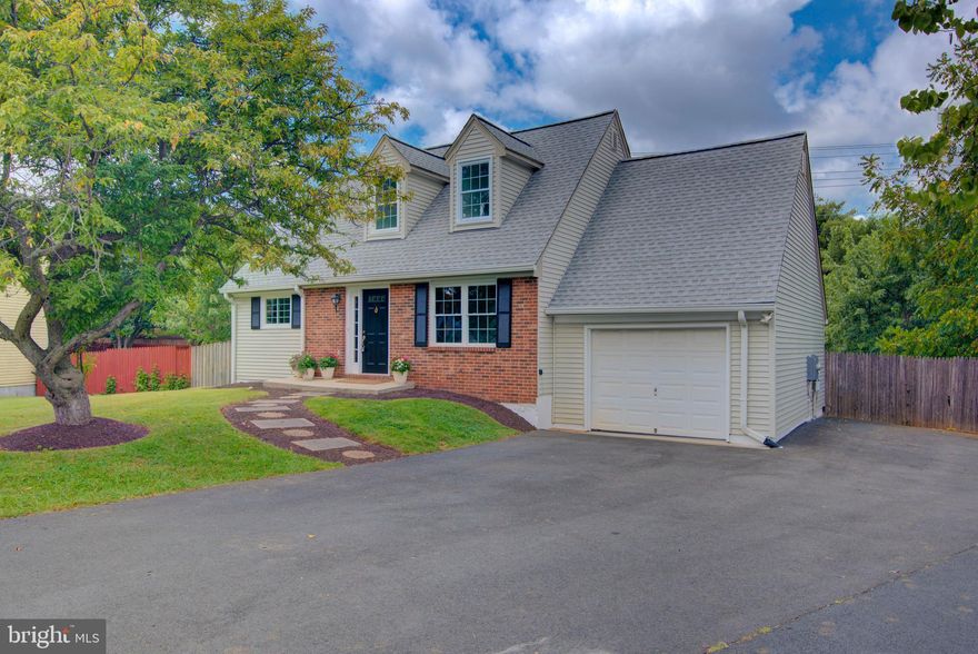 ​Charming and beautifully updated Cape Cod-style home nestled in the highly desirable Crestbrook community​, boasting 5 light-filled bedrooms, 3 updated full baths, and a two-tiered deck overlooking a .31-acre private, landscaped backyard, this home offers comfort, style, and space for all.
Step inside and be greeted by a bright and airy living room with gleaming hardwood floors that flow throughout the main level. The remodeled kitchen features white cabinetry, quartz countertops, and a brand-new stove. Slide open the glass doors to access your dual decks, ideal for outdoor entertaining and relaxing.
The fully fenced backyard is a true retreat, with terraced landscaping and fruit and nut trees, including cherry, pear, and chestnut, that are perfect for gardening enthusiasts or those who love the outdoors.
The main level also includes two spacious bedrooms and a​n updated full bathroom, offering flexibility for guests, a home office, or multi-generational living.
Upstairs, the primary suite impresses with two charming dormer windows, ​and a private updated full bath​. A second upper-level bedroom offers versatility as a sitting room, nursery, or walk-in closet.
The finished walk-out lower level provides even more living space with new carpet, a large recreation room, a bonus room ideal for a home office or gym, a legal bedroom, and an updated full bath. A sliding glass door leads out to the expansive backyard, designed for play, pets, and gatherings alike.
This is a prime ​location​, just minutes to Historic Downtown Herndon with shops, restaurants, concerts, a community center, farmers market, and town green. Commuters will love the proximity to Metro, Fairfax County Parkway, Route 7, Toll Road, Greenway, Dulles Airport, Reston Town Center, and One Loudoun.
Capital Improvements Include: 2025: Remodeled Kitchen with New White Cabinetry, Hardware, New Quartz Counters, New Sink and Faucet, New Stove. Updated Bathrooms Including New Vanities, New faucets, New Light Fixtures. Main Level Hardwood Floors Sanded and Stained. New Carpet on Upper Level. 
New Carpet on Lower Level. Interior of Home Painted. Exterior Trim, Shutters, Door Painted. Garage Painted. New Light Fixtures. Ducts Professionally Cleaned. Professional Landscaping. 2023: New Dishwasher. 2022: New Deck. 2021: Roof New Architectual Shingles. 2019: Repaved Driveway. 2018: Remodeled Upper Level Primary Bathroom. New Dryer. Terraced Landscaping in Backyard. Planted Fruit and Nut Trees Including Cherry, Pear, Chestnut. 
2017: New Refrigerator. 2016: Finished Garage Walls with Insulation and Drywall