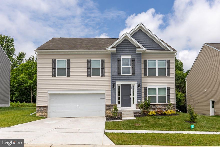 Welcome to this beautifully maintained detached bi-level home offering nearly 2,000 sq ft of above-grade living space and an additional 600 sq ft finished basement, all set on a generous quarter acre lot. Built with modern living in mind, this home features 3 spacious bedrooms and 3 full bathrooms, including a private ensuite in the primary suite for your comfort and convenience.  Stylish and durable vinyl plank and tile flooring flow throughout the main living areas, complementing the bright, open-concept design. The lower level adds extra living space with a full bath, ideal for a guest suite, home office, or recreation area.  A two-car garage provides ample storage and parking, while the expansive backyard offers plenty of room for outdoor entertaining, gardening, or play.  This property blends space, style, and functionality in a quiet, well-kept, new construction neighborhood, located close to main roads and shopping, providing easy access to all the amenities you need.  The seller is relocating, offering you a unique opportunity to own this exceptional home.  Don't miss your chance to own this nearly new home in a prime location.  Home is still under builder's warranty.