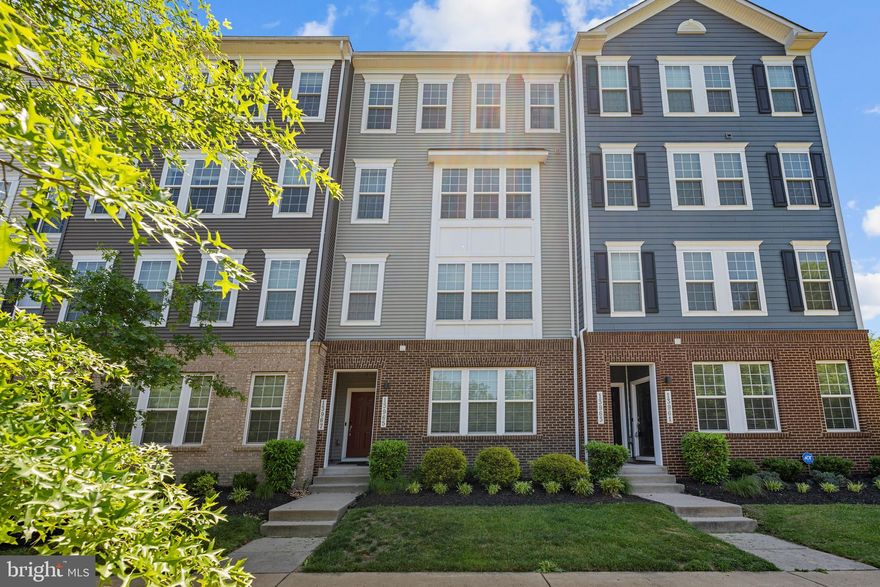 Welcome home to Heathcote Commons! This beautifully designed three-level townhome has everything you've been looking for - refined finishes, flexible living spaces, and a floor plan that works for the way you actually live. Head up to the light-filled main level, where gleaming hardwood floors set the stage for impressive living. The stunning kitchen features ample cabinetry, stainless steel appliances, sleek quartz countertops, and a classic tile backsplash. An oversized center island with breakfast bar seating flows naturally into the sunny breakfast nook - the perfect spot for morning coffee. The open dining area and generously sized living room flow seamlessly together, creating a wonderful space for entertaining or simply relaxing. Step outside to the deck and enjoy your own private outdoor retreat. Plush carpet leads you upstairs to the primary bedroom suite - a true sanctuary, spacious and serene - complete with a well-appointed en suite bathroom. Three additional bedrooms offer wonderful flexibility, perfect as a home office, guest room, or whatever suits your needs, and a full hall bathroom serves the floor with ease. Convenient bedroom-level laundry rounds out the upper level of the home. Downstairs on the entry level, a welcoming foyer leads to your private attached garage and driveway - offering convenient parking and valuable storage space right at home. Residents of Heathcote Commons enjoy access to beautifully maintained common grounds, a sparkling outdoor pool, a dog park, and a playground - something for everyone. Just minutes to Harris Teeter, Virginia Gateway Shopping Center, Regal Cinemas, Conway Robinson State Forest, Manassas Battlefield Park, and Dulles Airport. Quick access to I-66, Route 29, Route 15, Route 28, and Prince William Parkway makes commuting and exploring the region a breeze. Schedule your tour today!
