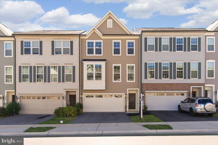 Almost too good to be true! Experience the best of modern townhome living in this stunning 3 level Miller & Smith built residence in the highly desirable Tallyn Ridge neighborhood. Thoughtfully designed with a bright, open floorplan and upgrades galore, this 3-bedroom, 3.5-bathroom home checks every box. Everything has been done! Brand new paint, new luxury vinyl plank flooring on the entry and main levels, and brand new carpet on the stairs, hallway and third floor bedrooms. The owners have had the home pre-inspected and are offering a 1-year home warranty. All your concerns have been addressed.  Entering the home on the lower level, you have generous flex space that can be used as a rec room, office, bedroom, or in-law suite with storage closets a cozy electric fireplace that conveys. The full bath on this level accommodates everyone with its raised commode and walk-in shower. You’ll be delighted by the main level upstairs with its open floor plan and plenty of natural east-west facing light. The gourmet kitchen with gas cooking is equipped with stainless steel appliances, granite countertops, ample storage space, and a reverse osmosis water filter for a healthier lifestyle. Have a casual meal at the kitchen island or enjoy a more formal gathering in the adjoining dining room. The living room is optimal for indoor/outdoor entertaining with the sliding glass doors to the deck offering plenty of light. Curl up in front of the electric fireplace on cool nights ,or conveniently slip outside for some fresh air with your morning or evening beverage. The upper level features 3 generous bedrooms and a full hallway bath with double vanities so everyone can have their own space. The primary suite is a true retreat, featuring a spacious layout, a walk-in closet, and an en-suite bathroom with double vanities and an oversized ceramic tile shower. The east-facing primary suite and bedrooms bask in the sunshine all day long. Experience outdoor living at its finest with a newly sealed deck, beautiful paver patio, and grassy area, plus a fenced yard providing privacy. Enjoy the convenience of the 2-car garage with plenty of room for storage. Tallyn Ridge is located just minutes from I-70 and I-270, offering an ideal commuting location. This is a vibrant and active neighborhood known for its open spaces, playgrounds, community pool, and walking paths. Nearby Pine Cliff Park is a beautiful waterfront park on the Monocacy River featuring trails, a boat ramp, sledding hill, and ice skating pond. Downtown Frederick, with its highly rated restaurants and boutique shops, is very close, offering even more convenience and entertainment options. Don't miss the chance to call this stunning house your home!