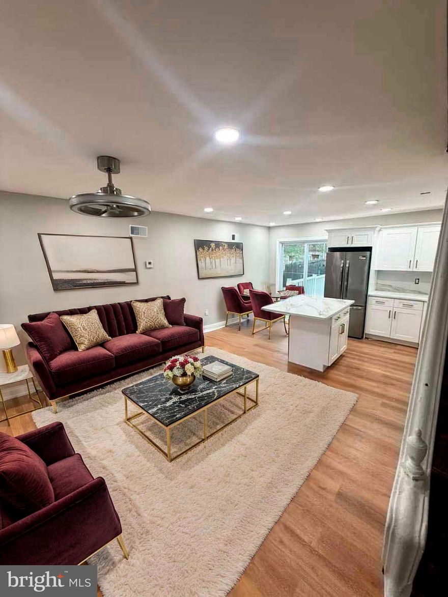 Welcome to this stunning property located in a vibrant neighborhood🏡! Step inside to discover a meticulously designed home boasting a wealth of modern amenities, and beautiful new floors. The first floor welcomes you with an Charming living room and dining area, adorned with a soaring ceiling featuring built-in lights, creating an inviting ambiance for entertaining or relaxation. There is a brand-new, kitchen with abundant cabinet space. Step out back to your rear deck for undwinding after a long day. . Ascend to the second floor, where you'll find twogenerously sized bedrooms🛏️ . A full renovated ceramic bathroom on this floor , provides a serene retreat for unwinding after a long day. 💯A finished basement provides even more versatile space, complemented by built-in lights and a full bathroom With its thoughtful layout and upscale finishes throughout, this property offers modern living. Don't miss the opportunity to make this your new home sweet home! Schedule a showing today to experience the luxury and comfort firsthand.🌟