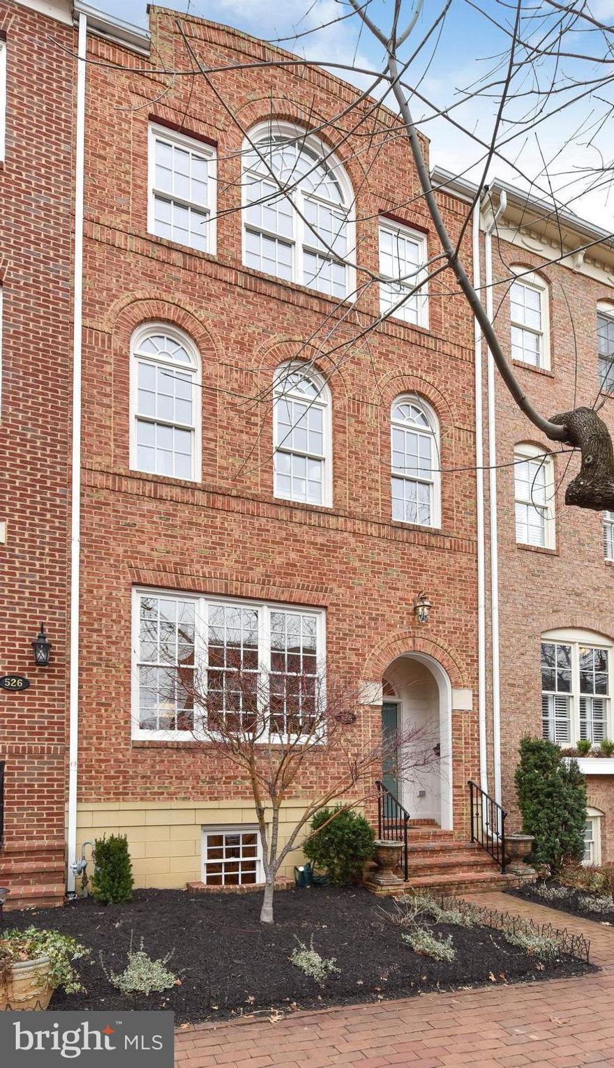 Sparkling 4 bedroom, 4.5 bath townhouse in Garrets Mill. Features include high ceilings, gleaming hardwood floors, new 2018 Bosch kitchen adjoins a sunny den with a French door to the private patio with built-in Weber grill. Tray ceiling in the master suite, a office with three beautiful arched windows, spacious bedrooms and a family room with gas fireplace. A 2 car garage completes this property.