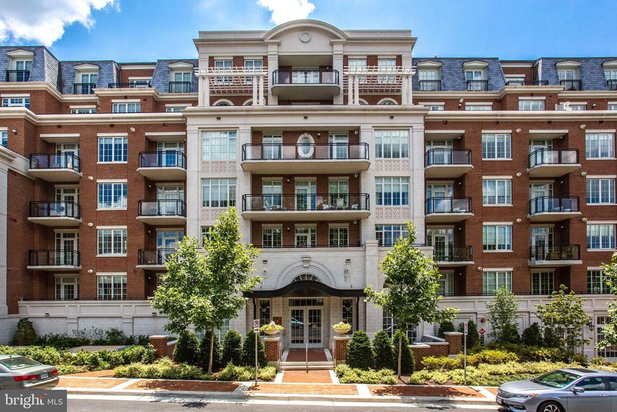Exceptional 2-bedroom, 2.5-bath corner unit with den in the heart of downtown McLean’s vibrant new-town streetscape. This bright and airy third-floor home offers tranquil tree views, fresh paint, and a spacious layout with an open kitchen, living, and dining area. Two generous balconies provide the perfect setting for morning coffee or outdoor relaxation. Thoughtful upgrades include mechanical and remote-controlled blinds, Lutron lighting, built-in speakers, and custom primary closet built-ins. The primary suite features a spa-like bath and walk-in closet. Additional conveniences include an EXTRA STORAGE ROOM (#309) on the same floor and two reserved garage parking spaces (Spaces 367 & 390). Enjoy resort-style living at The Signet with full-service concierge, a beautifully landscaped courtyard with four lounge areas, fire pit, trellis-covered outdoor bar and grill with dining space, clubroom, fitness center, sauna, steam room, massage room, fitness trail, pet spa, and more. An unbeatable location—just blocks to McLean’s shops and restaurants, minutes to Tysons, Georgetown, and downtown DC, with easy access to the Silver Line Metro.