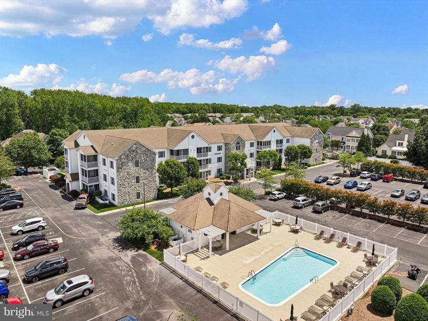 Introducing an elegant residence in the esteemed 55+ Cedar Bay community, Unit 1101 at 30619 Cedar Neck Road, Ocean View, DE. This sophisticated home boasts 1,485 square feet of refined living space, featuring three generously sized bedrooms and two well-appointed bathrooms, and on the ground floor with access to the parking lot from the unit.

Upon entering, you are greeted by crown molding and a formal dining room that sets the stage for elegant entertaining. The spacious living area is highlighted by a cozy fireplace, perfect for relaxing evenings. Enjoy the ease of air conditioning and the convenience of an in-unit washer and dryer.

The home's private porch offers a serene space to unwind, while its close proximity to Bethany Beach, Rehoboth Beach, and inlet State Park ensures endless opportunities for boating and leisure activities. An elevator provides effortless access, and the community pool is an inviting retreat on warm days.

Immerse yourself in this exquisite lifestyle, where modern comforts meet coastal charm, just moments from fine dining and shopping destinations. Experience the best this premier active adult community.