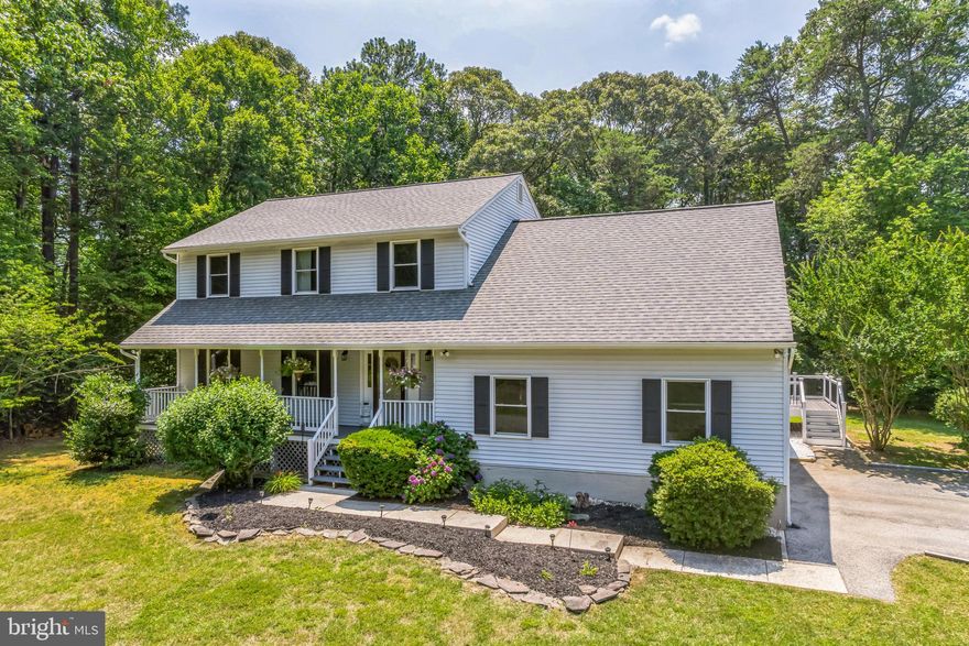 NEW PRICING!!!  SELLERS ARE READY TO MOVE TO THEIR HOME OF CHOICE.  PERFECTLY NESTLED on over 2 acres, this well cared for home is move in ready. Situated on a cul-de-sac in the Mutual Estates community, you have the best of all worlds. Privacy in a community and no HOA. This 5 bedroom, 2.5 bath home provides lots of living space and endless possibilities. The main level great room will certainly be the perfect spot for gatherings and day-to-day living. The kitchen has newer white cabinetry, stainless steel appliances, added prep sink, and lots of counter space. The expansive back deck is accessible through new French doors off the kitchen. The upper level has 5 bedrooms, with the primary bedroom ensuite bathroom and a full hall bathroom. The lower level is finished with new LVP flooring and freshly painted adding additional living space with walk out to the rear yard. Full bath rough-in for future full bathroom. There is plenty of parking area with the oversized paved driveway. Newer double hung windows, new carpet on upper level, hardwood flooring through main level except the great room which has new carpet, new French doors in great room to new side deck leading to driveway. This is a MUST SEE! Schedule your tour today!