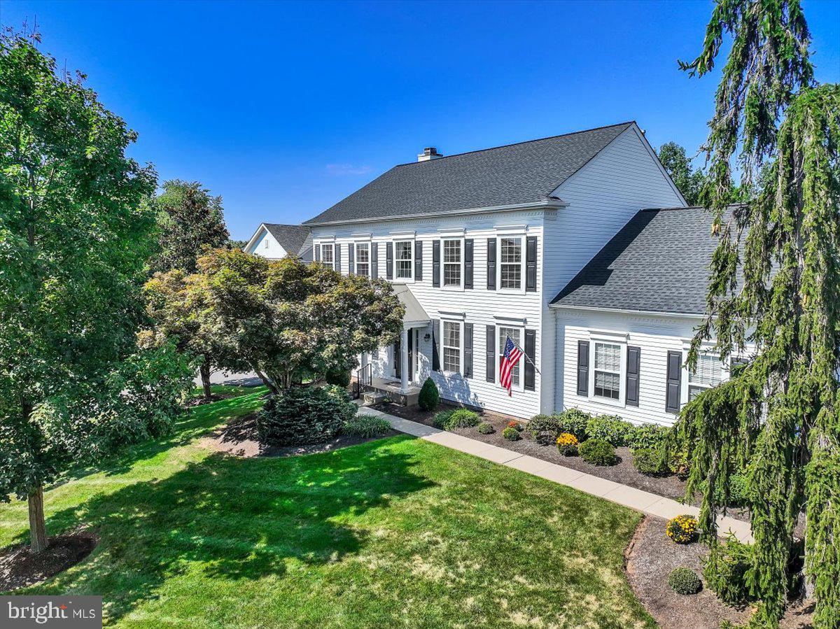 Welcome to 624 Chatsworth Drive, a beautifully maintained 4 bedroom, 2.5 bath colonial home located in the heart of the prestigious Talamore Country Club community. This home offers the perfect balance of classic design and modern comfort wrapped in a bright and inviting atmosphere. From the moment you step inside, you will appreciate the clean, neutral palette that allows your personal style to shine. Sunlight pours through the windows, filling the rooms with warmth and creating a cheerful sense of home. The traditional Colonial layout offers both formal and casual spaces—gracious living and dining rooms for entertaining, and a comfortable family room that invites relaxation. A well-designed, newly updated and nicely appointed kitchen serves as the hub of the home, offering plenty of space to cook, gather, and connect. A highlight of the kitchen is most certainly the built-in custom workstation with a counter height desktop, a place to sit, and an abundance of convenient storage for everyday essentials and staying organized! The main level also boasts high ceilings, hardwood flooring throughout, a cozy wood-burning fireplace, tasteful built-in bookshelves, a newly renovated powder room, and main floor laundry. Upstairs, the primary suite is vast, offering a private bedroom area, spacious ensuite bath, large closets, and a separate office or home gym. Should you need a nursery or fifth bedroom, this layout can easily accommodate those needs as well. Three generously sized bedrooms with ample closet space and a spacious hall bath complete the second floor. Each bedroom feels open and bright and offers flexibility for family members, guests, home office needs, or quiet retreats. Down below the full basement is currently unfinished, providing a tremendous amount of storage and the potential for additional finished living space in the future. An attached two car garage with inside access allows parking for two cars as well as additional room for bikes, strollers, outdoor equipment, and sports gear. Step out back to discover a lovely new brick patio, perfect for enjoying the outdoors and entertaining. Whether morning coffee, summer evenings with friends, or quiet moments at the end of the day, the patio expands your living area and enhances the connection to the beautifully landscaped grounds and expansive lot. Life at Talamore is about more than just a home—it is about lifestyle. As a resident, you will enjoy access to world-class amenities, including golf, swimming, tennis, a fitness center, scenic walking paths, dining, and a vibrant calendar of social events. The community is beautifully maintained and provides a welcoming atmosphere that makes it one of the most sought after neighborhoods in Horsham Township. Combining timeless Colonial charm, thoughtful updates, and the unmatched amenities of Talamore Country Club, 624 Chatsworth Drive offers an exceptional opportunity. Bright, neutral, immaculately kept, and move-in ready, this home is waiting to welcome you!