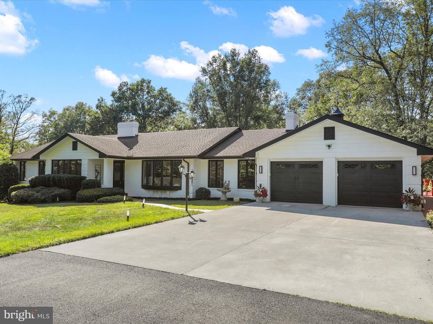 Luxury Ranch on almost 6 acres with In-Law Suite, Entertainer’s Patio & Car Enthusiast’s Dream Garage!

This completely renovated ranch home offers the perfect balance of privacy, convenience, and modern comfort. Nestled in a park-like setting with mature landscaping, you’ll enjoy peace and seclusion while still being just minutes from town, schools, and the national park. Designed with flexibility in mind, this property provides options for multi-generational living, entertaining, and future expansion.

Highlights & Features:

In-Law Suite: Complete with a brand-new kitchen featuring quartz countertops and stylish finishes.

Fully Renovated Interior: No expense spared with upgrades throughout, including LVL floors, custom tile showers, and modern touches in every room.

Chef’s Kitchen (Main Level): Quartz countertops, premium finishes, and an open design perfect for entertaining and everyday living.

Car Enthusiast’s Garage: Oversized garage tucked beneath the patio—ideal for car lovers, hobbyists, or extra storage.

Grand Entertainer’s Patio: Expansive outdoor living area with a brick fireplace, tons of seating/entertaining space, and surrounded by mature landscaping for privacy.

Multi-Generational Living: Both main and lower levels feature full kitchens with quartz counters, ideal for extended family or rental opportunities.

Future Expansion Options: Lower level includes unfinished areas that can be customized into flex rooms, offices, classrooms, or additional living space.

Bathrooms: Beautifully updated with tile showers and custom finishes.

Setting: Park-like grounds with mature trees offering both beauty and privacy.

This home is truly a rare find — whether you’re seeking flexible living spaces, an entertainer’s retreat, or a car enthusiast’s dream property, it has it all.

Want additional acreage? Additional 5.7 acre parcel can be purchased