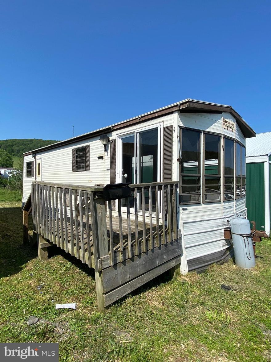 Lots of windows in this cozy space. Economic living in Terra Alta, WV. Tenant responsible for all utilities. Propane stove included.