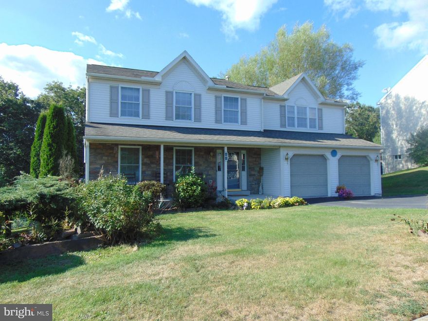 Two story Colonial offers all of the amenities you deserve.  Charming covered front porch.  Formal Dining room and living room.  Amazing custom Corian kitchen with upgraded appliances.  Large walk in pantry.  Breakfast area open to bright and spacious family room.  Half bath off foyer.  Second floor offers light filled Master suite with separate sitting room.  Master bath highlighted with doubles vanity, walk in shower and whirlpool tub.  3 spacious secondary bedrooms with abundant closet space.  Full main bath.  Finished walk out lower level with Great room, craft/laundry room with built ins and work bench.  Half bath.  Separate area for storage.  Access to expansive private backyard.  2 car garage.