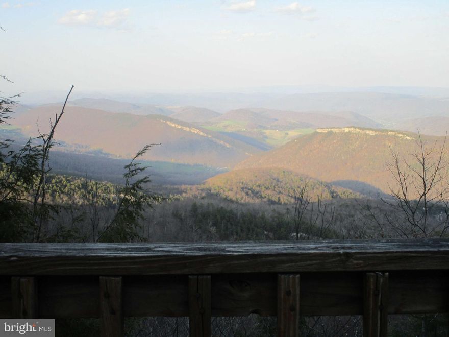 Cozy, fully furnished cabin located in Kile Knob development, Franklin area. The view from the deck of this beautiful cabin is amazing! The wood interior is very tastefully and uniquely done. Two beds and a bath on the main floor. Use the ladder to the loft for an extra comfy sleeping space or office. There's also a 9 acre common area for the property owners to use for hiking or picnicking.