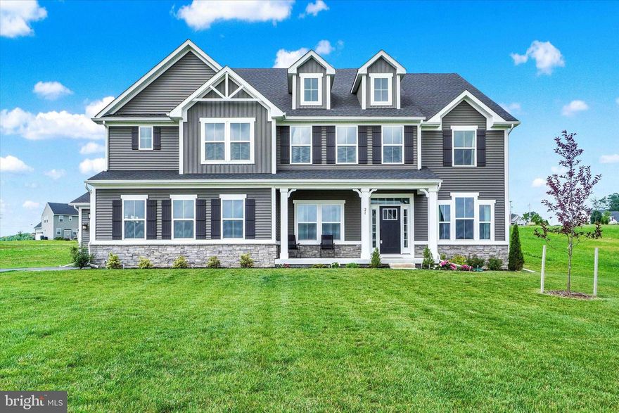 Welcome to High Pointe Estates – Luxury Living on a Sprawling 1-Acre Homesite
Discover the perfect combination of space, elegance, and convenience in this expansive Versailles model, ideally located on a 1-acre lot in the sought-after High Pointe Estates community. Enjoy the tranquility of suburban living just 5 miles from the Maryland line, with quick access to Rt. 30, Rt 83, and I-795 making commutes to Maryland effortless. 
If you seek an exquisitely maintained and generously spacious residence, your search concludes here. This distinguished and meticulously cared-for property awaits your esteemed consideration.
This impressive home featuring over 6,100 sq ft of finished living space offers 6 bedrooms, 5.5 bathrooms, and a thoughtfully designed floor plan that caters to modern lifestyles. Step into a bright, open foyer framed by a formal dining room and a private study—ideal for entertaining or working from home.
At the heart of the home, the expansive main living area showcases an open-concept design that seamlessly connects each space for effortless flow and everyday living. Step into the heart of the home—a breathtaking great room that exudes both grandeur and warmth. Towering floor-to-ceiling windows flood the space with natural light, framing sweeping views of the surrounding landscape and creating an atmosphere of openness and connection to the outdoors. Soaring ceilings elevate the space, while the sleek, open staircase adds a striking architectural element, seamlessly connecting the main level to the upper living area. Whether you're entertaining guests, or simply enjoying a quiet morning, this showstopping great room offers the perfect blend of elegance, comfort, and contemporary design. The gourmet kitchen features updated countertops, a large island center and ample cabinet storage along with a huge walk in pantry. The island is perfect for meal prep, casual dining, or enjoying a glass of wine with friends. Whether you’re a culinary enthusiast or enjoy casual dining, this space is sure to inspire your inner chef. Adjacent to the great room, a first-floor bedroom suite features a private full bathroom and a spacious walk-in closet for added comfort and convenience. Just off the kitchen, practical service wing provides access to the garage and a convenient powder room—adding both functionality and privacy.
Upstairs, unwind in the tranquil primary suite, highlighted by an elegant tray ceiling and a spa-inspired bathroom awash with natural light. Four additional bedrooms provide ample space for family or guests—one boasting its own private ensuite, while two others share a beautifully designed Jack and Jill bathroom. A convenient second-floor laundry room and a generous loft area enhance daily living, offering versatile space for relaxation, play, or work.
The finished lower level is designed for versatile living and entertaining, boasting a spacious recreation room and an additional bonus room ideal for homeschooling, a home office, game room, or even a potential seventh bedroom. A full bathroom adds convenience, while elegant French doors lead to walk-up stairs that connect seamlessly to the backyard. Ample storage space completes this well-appointed lower level.
This is more than just a home, it’s an elevated lifestyle. With its thoughtful design, modern updates, and a serene setting and with plenty of space for everyone, this home has it all! This home offers everything you’ve been searching for— Don’t miss the opportunity to make 21 Winifred your forever home!