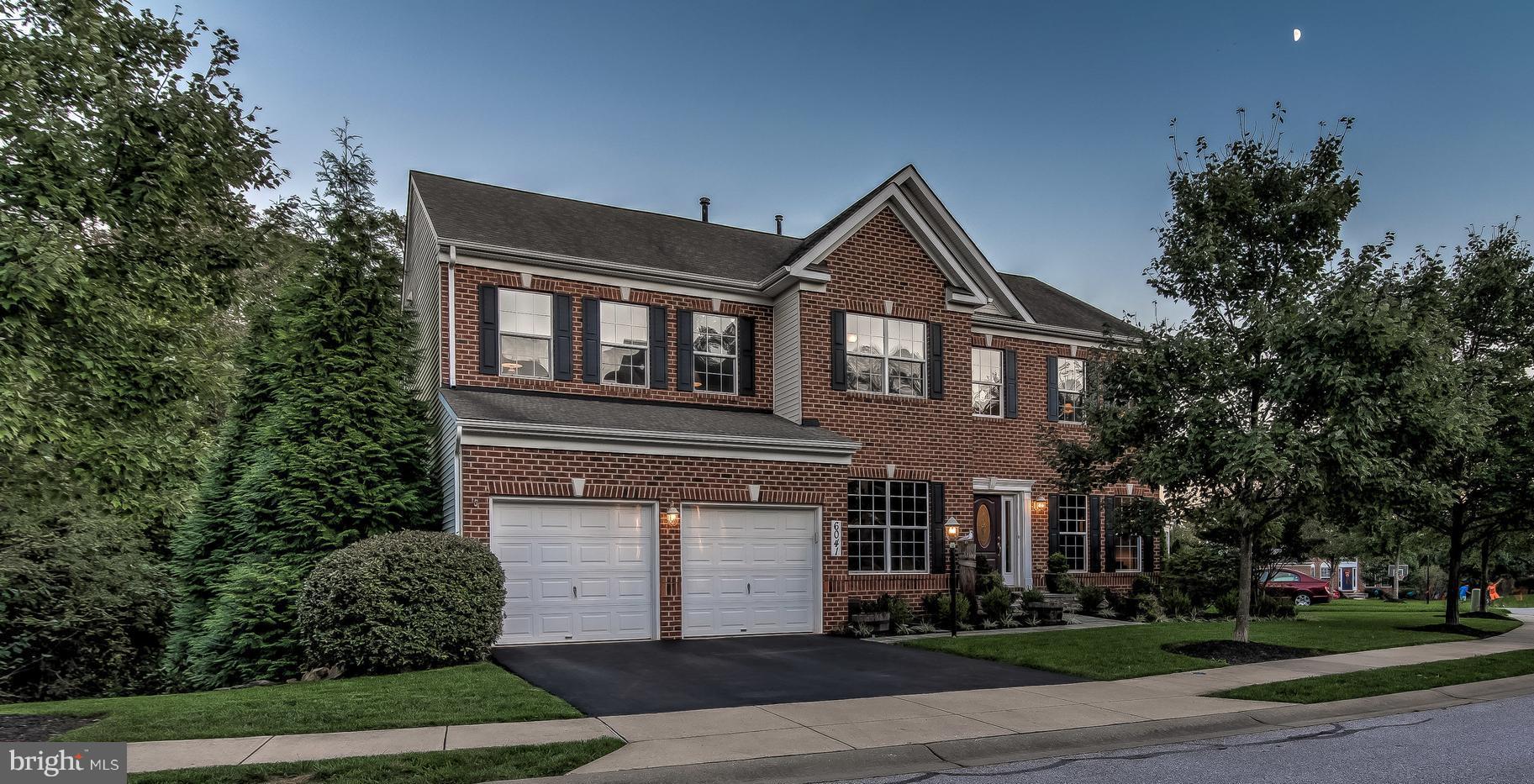 Welcome Home to 6041 Joseph Scott Drive. Perfectly cited near the cul-de-sac in the Patapsco Valleys coveted Hunters Ridge neighborhood, this meticulously maintained and thoughtfully updated home boasts over 4100 sq. ft of beautiful living space. Enter a light filled foyer, with an office, playroom or study to the left, and the living room to the right, which then flows to the dining room. Continue through to the large gourmet eat in kitchen, with breakfast bar & island, family room with a stone wall and gas fireplace, and sun room that opens to the deck, all with magnificent views of the Patapsco Valley. A half bath, and access to the large 2 car garage complete the first floor. The second floor has an expansive owners suite with a sitting room or office, large walk in closet, and luxury bath, and three additional bedrooms and full bath. The lower level offers another large bedroom, with full bath, exercise room, and oversized recreation room with wet bar, which opens to the outside living space and hot tub. All new landscaping with a natural stone wall, patio, and ambient lighting envelops this private oasis and invites you to enjoy the natural beauty and privacy provided by the Patapsco Valley.