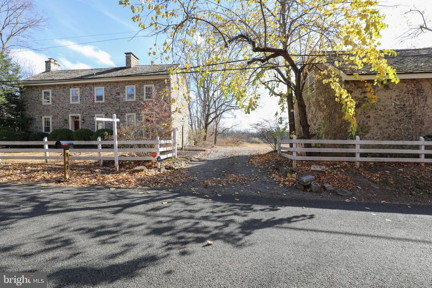 Discover timeless elegance and historic charm on 10 breathtaking acres in the heart of New Hope. This enchanting estate is a rare gem, the perfect harmony of rustic charm and modern refinement. The classic stone farmhouse exudes warmth throughout with pumpkin hardwood floors, three inviting bedroom, 2.5 bathrooms and renovated kitchen showcasing soapstone countertops and stainless steel appliances. The spacious third floor attic offers endless possibilities, whether you dream of a secluded reading nook, an inspiring office or a whimsical guest retreat. Beyond the main residence, a two story barn and carriage house garage add both function and flair, providing ideal spaces for storage, workshops or even a studio. The lush grounds offer ample opportunities for privacy, recreation or future expansion. The property is conveniently is subdivided for flexibility.  The property is sold as one. The six acre piece in the back ,could be sold or one house could be built Don't miss the opportunity to make this extraordinary property your personal retreat and a place to create memories for generations to come.