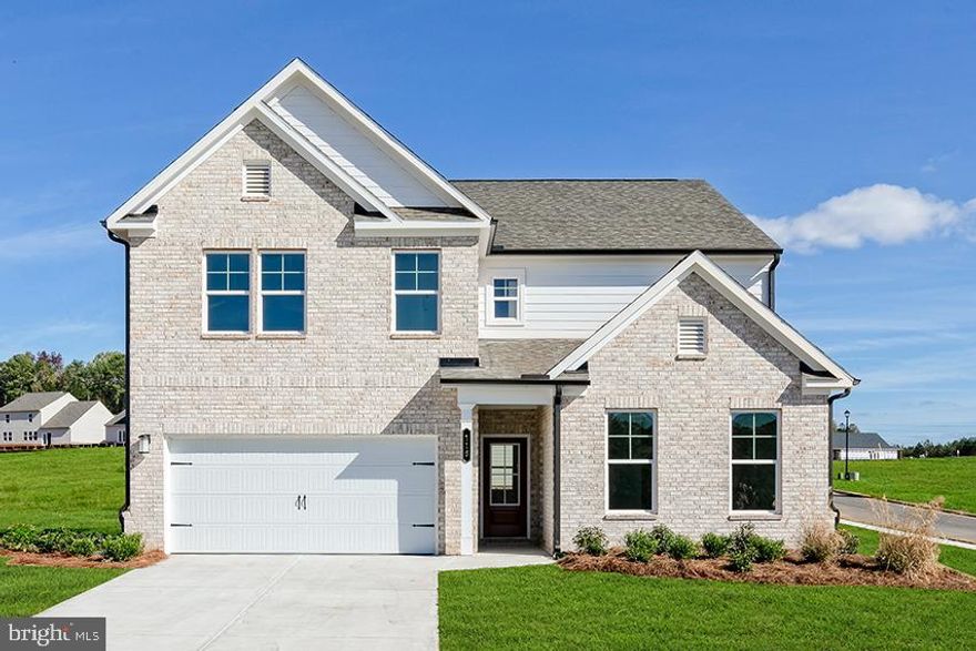 Welcome to Brandywine Woods! This beautifully upgraded Mathis floorplan offers exceptional space, modern finishes, and incredible versatility—priced at $691,025.

This home features a stunning gourmet kitchen with double wall ovens, cooktop, quartz countertops, and stainless steel appliances, perfect for both everyday living and entertaining. The open-concept layout flows seamlessly into a spacious family room, highlighted by a sleek electric fireplace.

Designed with flexibility in mind, this home includes a finished lower level with recreation room, full bath, and optional kitchenette, making it ideal for guests, multi-generational living, or added entertaining space. Step outside to your expansive covered deck, perfect for relaxing or hosting gatherings.

Upstairs, retreat to your luxurious primary suite featuring a freestanding soaking tub, spa-style shower, and expanded closet space. Additional highlights include a private bath for Bedroom #2, upgraded flooring throughout, and designer finishes from the Signature Collection.

This home also comes complete with a washer, dryer, and refrigerator, making it truly move-in ready.

Located in the highly desirable Brandywine Woods community, this home offers the perfect combination of style, space, and value. Don’t miss your opportunity—schedule your tour today!