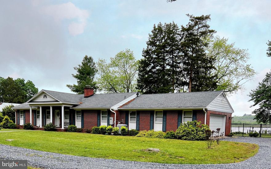 Escape to waterfront living at its finest in this spectacular home. Launch your boating adventures off your private Pier with approx. 6'+/- water depth & the ease using a convenient boat lift, providing secure storage for your vessel while ensuring quick access to the open waters of the Choptank River .  Step inside to discover an array of luxurious upgrades-increasing sq ft to approx 1,900+/- living space, including cozy fireplace, spacious bedrooms, elegant bathrooms, and inviting communal areas, all thoughtfully crafted to ensure comfort, functionality, and style. Elevate your culinary creations in the chef's dream kitchen, equipped with high-end appliances, ample counter space, custom cabinetry, and thoughtful design elements to inspire your inner chef while enjoying a chilled bottle of wine from your Wine Cooler or turn to the additional Icemaker to make that special beverage.  Experience unparalleled convenience with both a whole home Generator, two-car attached garage and a detached two-car garage, offering ample space for vehicle storage, workshop activities, and additional storage needs. Host unforgettable gatherings in the outdoor fenced entertaining areas, featuring a waterfront patio, landscaping, and plenty of room for dining, lounging, and enjoying the company of family and friends or enjoy the spectacular view from your 4 Seasons Sunroom.  Added Bonus: No HOA fees or Flood Insurance required. This could be yours before the End of Summer - call to schedule your private tour today