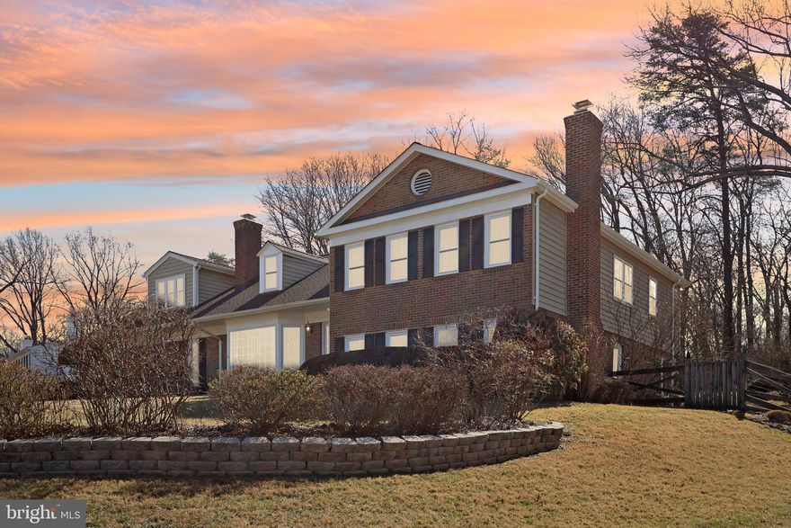 Fantastic Opportunity to own this builder’s model home that has been significantly updated and expanded to over 4,366 SF on 5 levels. The main level has modern open architecture featuring a huge Kitchen with, not one, but two islands and two sinks, Dining/Breakfast Room with a beautiful Bay Window and Fireplace, and a combined super cozy Living/Family Room. Half a flight down from the main level is a large second Family Room with a brick accent wall, wood Fireplace, a sixth Bedroom/Office/Exercise Room, Laundry Room, and Full Bath. And wait there is more. Half a flight down again is a 600 Sq. Ft. Recreation Room /Man Cave with Wet Bar and Full size Refrigerator for a third separate living and entertainment area in this expansive home. 

Half a flight up from the main level are four roomy Bedrooms, three which share a common bath and a second Master Bedroom with its own private bath and double closets. Just six steps up again is a Huge Master Bedroom and Bath with His and Her Vanities, Jetted Tub, Walk-In Shower, Gas Fireplace, Private Bar, Sitting Room and Walk-In Closet.  

The home has a side-load, 2.5 car garage. The back yard has a large concrete Patio, shading Pergola and stone landscaping tying the main Patio to a separate Sitting Area  The large concrete driveway has room for additional parking. This home is sited on a cul-de-sac, backing to acres of Parkland in one of Vienna’s premier neighborhoods. There are just two many features to list here. Come and see this beautiful and exciting home for yourself at one of our open houses.