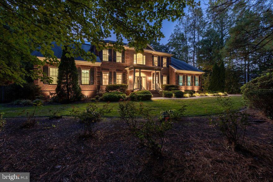 This 6,500-sqft estate is a lifestyle experience. The grand foyer & sweeping staircase offer a dramatic welcome to a residence of rare distinction. The home boasts seven bedrooms, four full baths, & two half baths. The chef's kitchen balances professional-grade function with stunning form. Outfitted with Sub-Zero, Wolf, GE Monogram, dual Kitchen Aid dishwashers, pot filler & double islands inviting culinary creativity while anchoring the flow of the home. The main level primary suite is a true retreat. Upstairs, two additional living areas & a gracious porch offering views of the pool & basketball/pickleball/volleyball court. The home embraces thoughtful inclusivity, with an elevator, ADA-compliant doorways, & custom roll-in tiled showers; an ideal sanctuary for multigenerational living. Truly functional with upstairs & downstairs laundry. Set in a community known for its schools & convenience to city amenities, the property offers a lifestyle of exceptional ease & enduring value.