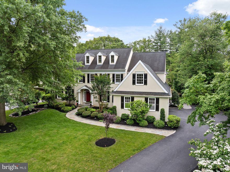 Welcome to 704 Turnbridge Road, a stunning home nestled in the highly sought-after Treyburn community of Wayne, PA. Set on a quiet, tree-lined street in one of the Main Line’s most beloved neighborhoods, this beautifully maintained residence offers over 5,100 square feet of finished living space and a floor plan that effortlessly blends formal elegance with everyday comfort. The moment you step through the front door, a grand Foyer with soaring ceilings sets the tone and creates a natural flow into the formal and informal areas of the home. The Foyer is flanked by an elegant Dining Room and a gracious Living Room with a fireplace—perfect for entertaining. Behind glass doors, a private Office provides a quiet space for work or study. At the heart of the home is a breathtaking two-story Family Room, anchored by a dramatic  fireplace and a wall of windows that fill the space with natural light and frame views of the backyard oasis. Hardwood floors continue into the Breakfast Area, where sliding glass doors lead to a spectacular flagstone Patio bordered by charming stone knee walls—ideal for outdoor dining or relaxing in a serene setting. The Breakfast Area opens into a sunny and spacious Kitchen featuring a center island, built-in desk area, and walk-in pantry. Adjacent to the Kitchen is a well-appointed Mudroom and Laundry Room with direct access to the attached three-car Garage. A stylish Powder Room completes the First Floor. Ascend the butterfly staircase to the Second Floor from either the Foyer or Kitchen, where the luxurious private Primary Suite awaits. This serene retreat is generously sized and filled with natural light, featuring soaring ceilings that add to the grandeur and a tranquil sitting area perfect for unwinding. Dual walk-in closets provide abundant storage, while the spa-inspired Primary Bathroom offers double vanities, a soaking tub, a large glass-enclosed shower, and a private water closet—an elegant escape designed for both comfort and indulgence. Three additional Bedrooms complete the Second Floor—one with its own ensuite Bath, ideal for guests or family members seeking privacy. The other two Bedrooms are serviced by a beautifully remodeled Hall Bathroom featuring timeless finishes and modern touches, creating a fresh and polished space for daily living. The finished Lower Level offers an abundance of additional living space, thoughtfully designed for both everyday enjoyment and effortless entertaining. Anchored by a stunning stone fireplace, this level features a spacious game area, a comfortable movie viewing zone perfect for cozy nights in, and a separate exercise room to support an active lifestyle. With high ceilings, quality finishes, and plenty of storage throughout, this Lower Level seamlessly extends the home’s functionality while maintaining its refined aesthetic. Set within the tranquil and beautifully landscaped Treyburn community, 704 Turnbridge Road offers the rare combination of timeless elegance, modern amenities, and an unbeatable location. This magical neighborhood is known for its quiet streets, private walking trail, sense of community, and proximity to top-rated schools, shopping, dining, and major commuting routes. Whether hosting unforgettable gatherings or enjoying peaceful moments at home, this exceptional residence promises a lifestyle of comfort, luxury, and cherished memories!!