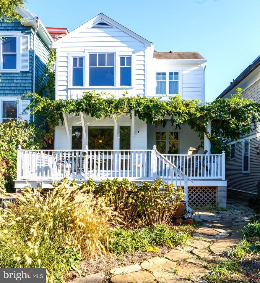 Cape Cod with an abundance of charm and character located on a sought-after Historic District waterfront street. Views of Spa Creek from both the master bedroom and family room. Bedrooms have updated ensuite baths and walk-in closets. Formal and casual living and dining areas perfect for entertaining. Spacious deck overlooking the landscaped yard. Hardwood floors and built-ins throughout.