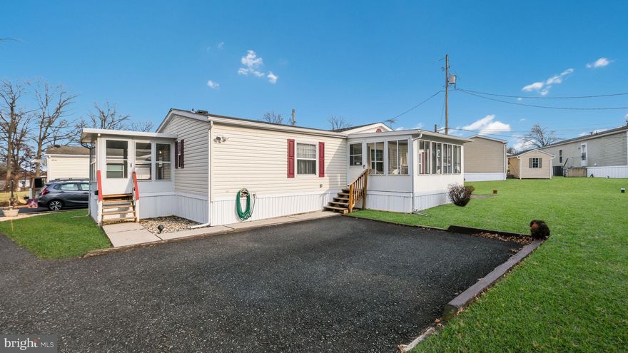 A Rare Find in the Desired  Rockhill Village Adult Community in West Rockhill!  

This Double Wide Home has been well maintained and has many upgraded features to include NEWER Windows, NEWER Water Heater AND the ENTIRE HVAC System was also UPDATED in 2015! 

Located on one of THE MOST PRIVATE LOTS with views of fields and trees makes this a PRIME location for bird watchers and to enjoy peace and quiet!

Your guests will be greeted in the NEWER Oversized Sunroom with oversized windows on all three sides and an additional door to the side yard and secured storage shed!

The Living Area Floorplan is very flexible and can accommodate differing room set-ups, depending on your furniture and desires.

The Living Room is very spacious with a fireplace, vaulted ceilings and oversized windows to let all the light into the home! 

There is an Eat-in-Kitchen AND a Dining Area OR use the Dining Area as a Sitting Area for book reading and coffee sipping while relaxing in the morning sun! 

The Eat-In-Kitchen offers plenty of cabinetry, a NEWER Stove and Built-in Microwave AND ample counter space for cooking, baking and entertainment!  

The Bedrooms are conveniently located on opposite sides of the home within this much-desired floorplan, so you could have two master suites!

The Main Bedroom Suite includes a private bath with a full tub, shower and an oversized vanity.

The Second Bedroom is very spacious with ample room for another Sitting Area and has an oversized closet with close access to the Hall Bath. 

With the Second Bedroom and Hall Bath being located on the opposite end of the home as the Master Bedroom, this home's floor plan truly has a SECOND Master Suite!  

The Laundry Room has cabinets and shelving for even more storage AND an outside access door to ANOTHER Sunroom overlooking trees and fields! 

Plenty of storage is available not only in the bedrooms but also in the oversized hall closet, the laundry room and the exterior storage shed.  

Want to save on TV costs?  There is a functioning antenna for all your streaming services or you can easily enjoy these services through Cable or Fios. 

The location is private with plenty of sunlight for a garden or just a great place to hang out & enjoy your morning coffee while watching your bird friends! 

The location is close to In-Town Shopping, many Restaurants, a Library and multiple Grocery Stores provide even more convenience while still being in one of the most desirable towns of the Philadelphia Suburbs!

Don’t miss out on this well-priced home!