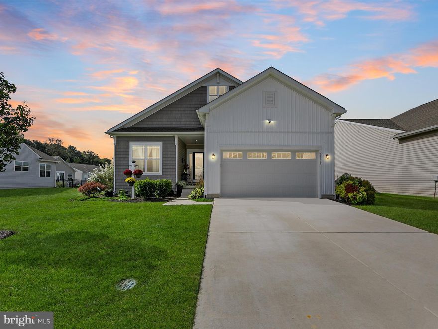 Stunning Resort-Style Home in a 55+ Active Adult Community with numerous upgrades. This home seamlessly blends luxury and practicality, making it perfect for those who cherish both elegance and comfort. Welcome to your dream retreat in this amenity-rich, low-maintenance 55+ community! This exceptional home features five spacious bedrooms and three full baths and 3,630 sq ft of finished living space, designed for effortless living and entertaining and is just minutes from downtown Lewes and the beaches.

Enjoy the convenience of primary living spaces on the main level, including three bedrooms and two full baths. The seamless flow between the living, dining, and kitchen areas is enhanced by recessed lighting and luxury vinyl plank flooring, creating a bright and inviting atmosphere. Chef's Kitchen with extra-large granite island, double wall oven, built-in microwave, gas stove and glass display cabinets.   A newly added sunroom offers breathtaking views of the serene pond and paver patio featuring a built-in grill with a piped gas line and a granite prep area, surrounded by upgraded landscaping.

The lower level is an entertainer's paradise, featuring two additional bedrooms and a full bath, Family Room and a built-in bar for your visiting guests, as well as a storage room and utility room.  This home includes a two-car garage with an epoxy floor, a separate irrigation well for easy maintenance, and a piped gas line for a future home generator.  

Experience an active lifestyle with resort-style amenities, including walking trails, fitness centers, and much more, all designed to enrich your life and foster connections with neighbors.  Don’t miss this opportunity to own a slice of paradise in a vibrant community that caters to your every need.