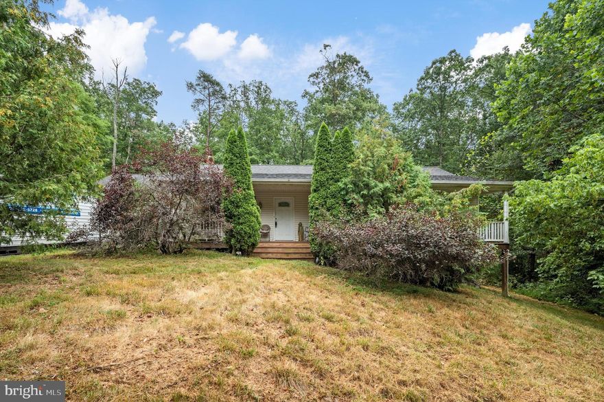 Discover this charming 3-bedroom, 2-bathroom ranch-style home, ideally situated just off Route 50, minutes from Winchester Medical Center and downtown Winchester. Nestled on 5 picturesque acres, this property offers ample space for outdoor activities and serene living. The house features a newly installed HVAC system (2024) and a newer pressure tank, ensuring comfort and efficiency. While some updating is needed, this home presents a fantastic opportunity to customize and create your dream residence in a prime location. Don’t miss out on this perfect blend of convenience and potential.