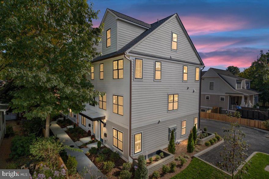 END UNIT in the new construction townhome community of Irving + Ninth in Lyon Park.