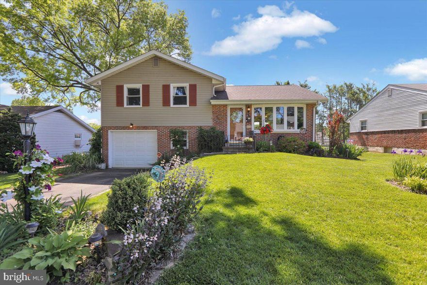 HIGHEST AND BEST due Monday, June 9 by 7pm.  This 4-bedroom gem is located in one of the most sought after quiet neighborhoods in Wilson school district.  Walking distance to the school sport fields and the local pool.  If spending time outdoors is important to you, your kids, and your pets, you will fall in love with this large, private fenced in yard with perennials flower beds adding color for 3 seasons - a relaxing and pretty entertaining area.  And between the large deck and the large patio, this is THE place for cookouts spring, summer and fall.  Back inside, you’ll appreciate the hardwood floors found throughout this home.  There are 3 bedrooms and a full bath on the upper level, plus a walk-up attic for storage, something new homes just don’t have.  The main level offers a nice sized living room with a large bay window, and patio doors from the dining room leading out to the deck for quick access to the grill from the kitchen.  This home is much larger than it looks, and you’ll notice this as you go down a level to a bonus room, which is being used as the 4th bedroom, but would make the perfect office, or hobby room.  There is a half bath, a generous sized laundry room with a 3-month new washer, and an exterior door leading out to the patio.  One level down is the family room with a woodstove, which is capable of heating the entire home all winter long, keeping your heating bills nice and low.  Along with the low property taxes, this home is very economical.  Come check out all this home has to offer!