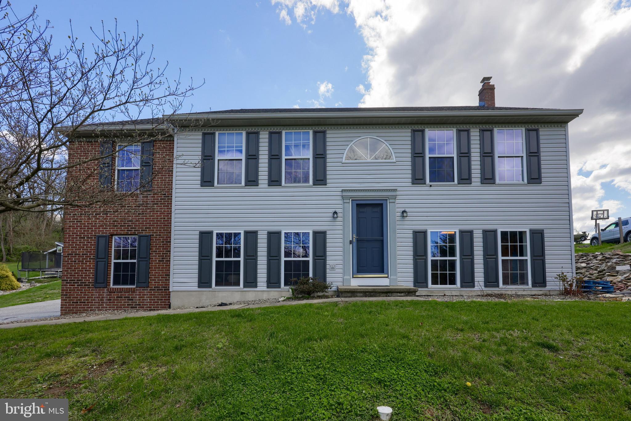 Welcome to the serene countryside of Strasburg, PA! This 4-bedroom, 3-bathroom residence offers a spacious and inviting interior with a modern open-concept living and dining area perfect for entertaining. The updated kitchen is equipped with granite countertops, ample cabinet space, a large island, and a great set of appliances. The cozy living room features vaulted ceilings, hardwood floors, complemented by large windows that flood the space with natural light. Down the hall you have the main bathroom, 2 bedrooms, and a master suite complete with an en-suite bathroom featuring a walk in steam shower.
The lower level provides a versatile space great for kids play area or additional family room. This space is adjoined by a bedroom and bathroom with its own outside entrance. Also included on this level is the laundry area and access to the attached 2 car garage.
Stepping outside onto the back deck, you'll find scenic views await, creating a perfect space for morning coffee or evening gatherings. The backyard has lots to offer including a swing set, chicken coop and a garden area. Many recent updates included a new roof in 2023, new heater unit and a new AC unit in 2022, ductwork cleaned in 2024 and filters replaced in the last least few months ensuring low maintenance and peace of mind for many years. Nestled on a quiet street in a peaceful neighborhood, this home has much to offer with easy access to local amenities and falls within the highly rated Lampeter-Strasburg School District. Don’t miss the chance to make this beautiful property yours!