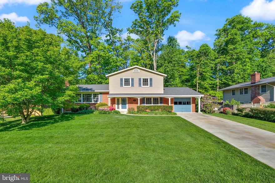 Incredible opportunity in the Woodson High School pyramid in the sought- after Rutherford community. This 4 bedroom, 2.5 bath home has so much to offer and every room shows pride of ownership.

Step inside the foyer of this beautiful home and the natural light is abundant. The living room boasts newly refinished hardwood floors, a large picture window, and wood burning fireplace. There is a separate formal dining room with space for a large table and views of the backyard. The large gourmet eat-in kitchen has Cambria quartz countertops, beautiful 42 inch cabinets, under cabinet lighting,  plenty of counter space and a breakfast bar. Brand new stainless steel refrigerator, dishwasher and oven purchased in (2026) as well as a built-in microwave oven. The breakfast nook overlooks the treed backyard and brings the outdoors in.  You will also find a main level bedroom or office, powder room and laundry room on the main level and access to the one car garage. 

The upstairs provides access to three bedrooms, a primary with en suite, updated bathroom and refinished hardwood flooring and two additional bedrooms that share an updated hall bath. The lower level provides a great rec room or den with a wet bar and a large utility room.

Step outside and enjoy the serenity of the landscaped back yard.  Plenty of room for outdoor entertaining on the expansive deck and fully fenced in yard.

Other updates to the home include new roof (2025), Fresh Paint (2026), Refinished Hardwood Floors (2026), Updated bathrooms, H2O Heater (2019), Carrier AC (2019), Electric Panel (2007) and sump pump (2005) with battery back-up. 

The property is in a great location close to Rutherford Park and Rutherford Pool. It is steps to the Fairfax Connector Bus route 835 to the Pentagon. Close to major commuting routes Rt. 236, 50 and 495, shopping and restaurants.
