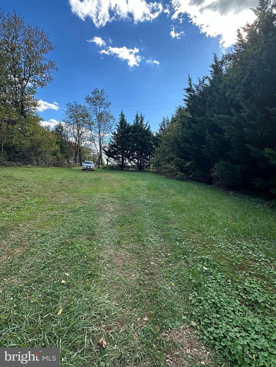 Beautiful one acre lot in Montgomery County's Agricultural Reserve with a 3 bedroom perc.  Property has a barn with stables, a small cabin with electric and a well.  Panoramic views of a beautiful horse farm surround the property.  Call alternate agent with any questions.