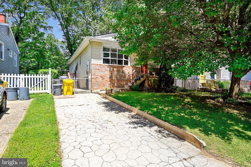 Absolutely adorable rancher in Woodland Beach with a full basement.  Wide open kitchen with bar, dining area and living room.  Beautiful hardwood floors on the main level.  3 nice sized bedrooms. Master with half bath.  Lower level has large  family room, a 4th bedroom (?) or playroom, laundry area and a great workshop!  Solar panels on roof help with the electric bill.  Hook-up for a generator (never used so it is "as-is").  Fully fenced backyard with a nice-sized shed to hide the mower and the toys.  Location is close to everything Edgewater has to offer.  Blue Ribbon Schools. Walk to Edgewater Elementary.  Very easy access to Rte 50, or Rte 214 to get to DC, or Annapolis.