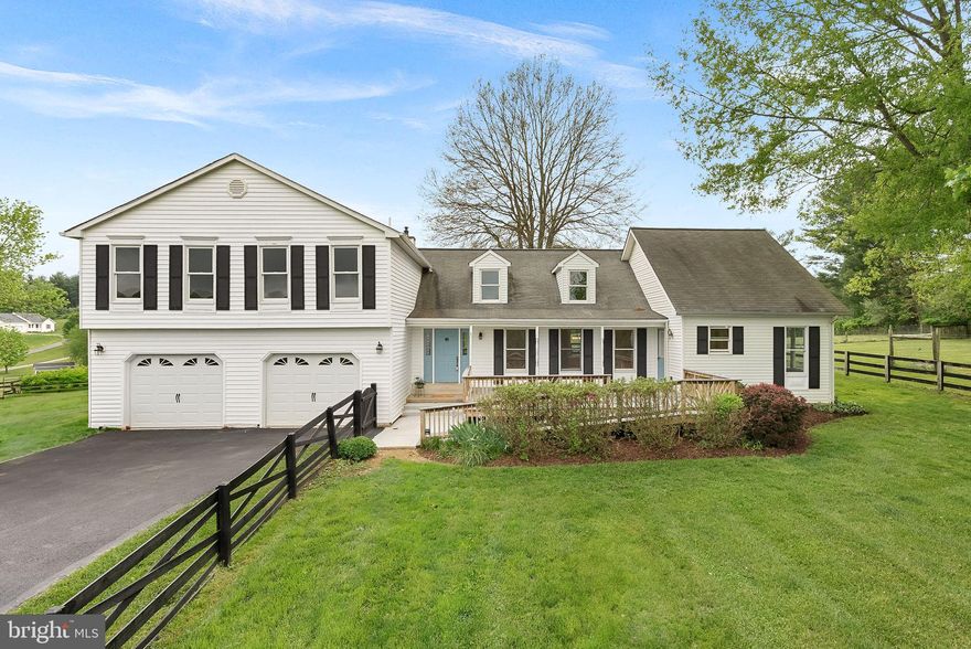 Have you been waiting for a large home with a private 4 acre lot, amazing views and barn?  Also a bonus apartment with separate entrance and wheel chair accessible kitchen and bath.  Interior has fresh paint, hardwood floors and new carpet.  Large front deck with a view  of sunrise and screened porch with amazing sunsets make this home perfectly situated.  Country kitchen adjoins main level family room with stone fireplace ideal for family gatherings.  Primary suite has an attached bonus room/walk in closet and bathroom.  Apartment is ideal for in-law suite, au pair, home school area....  Barn with 3 stalls and electric.  Large fenced garden area.  Ideally located off a hard surface road in between Waterford and Lovettsville, which allows for commuter options.