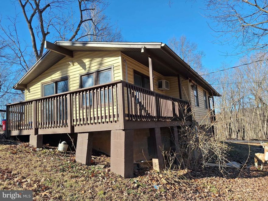 Two-bedroom one bath home in the popular river community of Shenandoah Shores. With comcast internet availability it would make a great place to work from home! The paved driveway offers ample parking. New flooring in the kitchen and living area, and new carpet in the bedrooms. Brand new mini-split HVAC system. With some TLC this home would make a great first home or investment property. Close to I-66 for easy commuting. This home is located in the Sanitary District.
Additional .36 acre lot is included in the sale. Tax ID 13C1E9