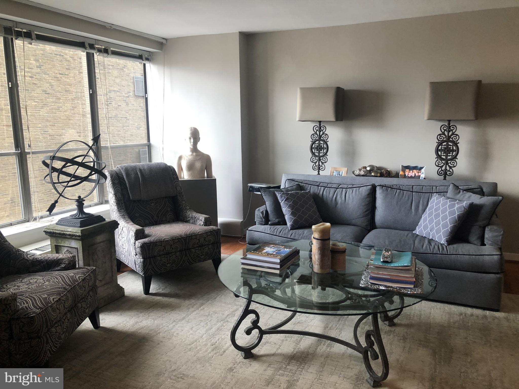 Spacious, updated two bedroom with a private balcony at The Dorchester on Rittenhouse Square! There are hardwood floors in the foyer and living room/dining room; berber carpet in both bedrooms; and an updated kitchen featuring wood cabinetry, stainless steel appliances, granite countertops and an undermount sink. Both bathrooms have vanities with granite countertops, updated faucets and light fixtures. Residents of The Dorchester enjoy a twenty-four-hour doorman and all utilities included in rent except cable TV/internet. Use of the building's state-of-the-art fitness center, seasonal rooftop pool club, and valet parking in the building's underground garage are available for an additional fee, subject to availability. No pets permitted. Rittenhouse Square is ranked the 6th best neighborhood in North America with 175 restaurants and 199 retailers within a three block radius. The Dorchester is within walking distance to the Market Street office corridor, The Avenue of the Arts and University City. 30th Street Station and Philadelphia International Airport are a short commute.