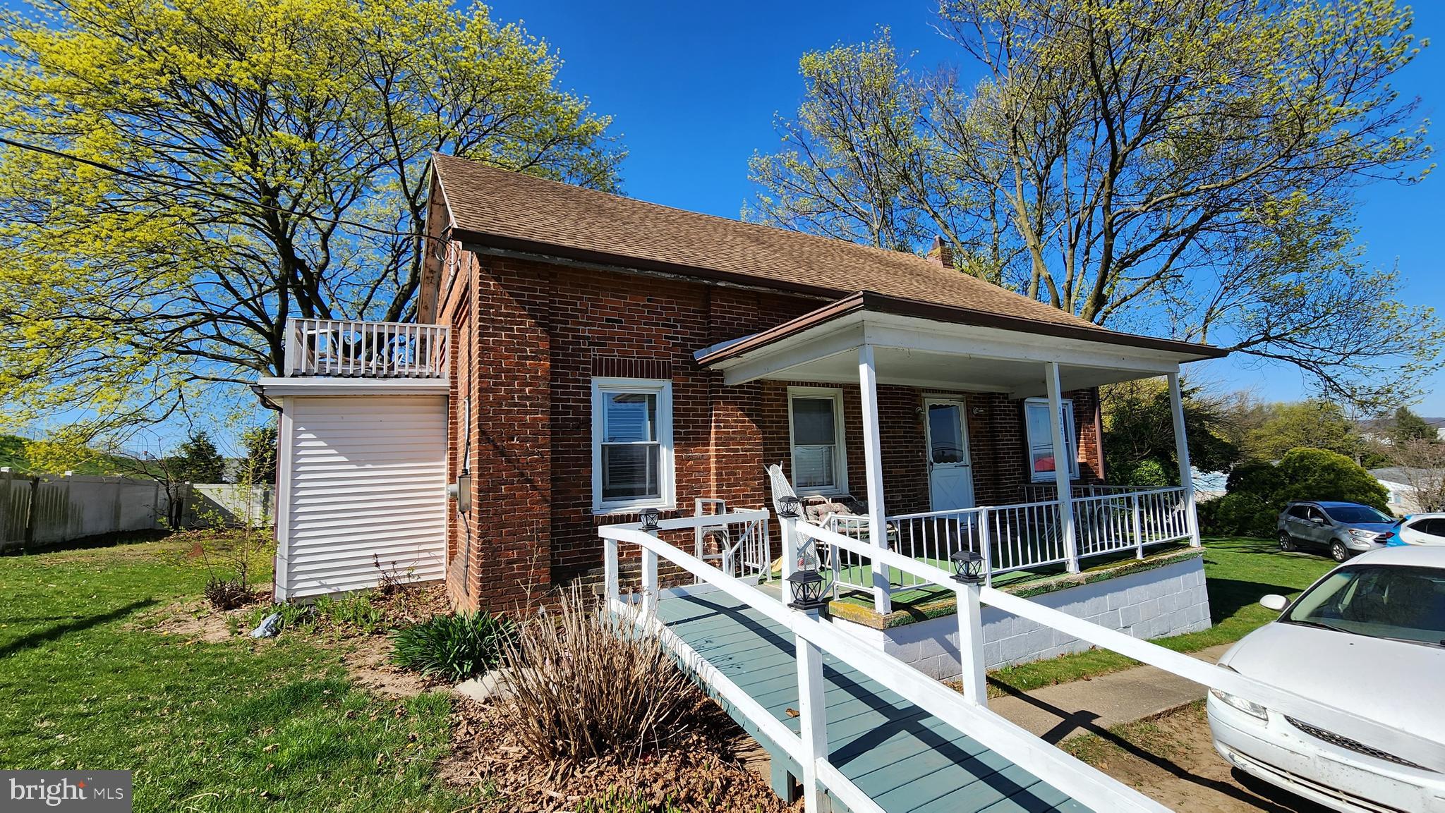 Welcome home! This charming 2-bedroom, 1-bathroom home is located in the Northeastern York School District and offers a unique history as it was originally a one-room schoolhouse. Situated on a spacious lot in East Manchester Township, this property provides ample outdoor space for your enjoyment. The home features 1,080 sqft of living space, with one-floor living. Some current updates include: the porch has been repainted, a ramp has been added for accessibility, and there is a new mailbox and wooden swing set. The windows have also been updated. With its historical significance and recent updates, this home offers a blend of character and modern conveniences. Don't miss the opportunity to own this unique property. Schedule a showing today!