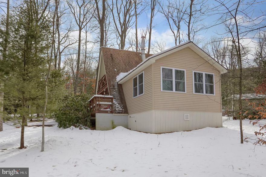 Welcome to a cozy A-Frame on 3.39 acres in the Heritage Hills! This secluded 3-bedroom home has new upgrades which include the living room/dining room, laundry and central A/C. The three separate tracts that make up this property provide elbow room and privacy, but also renders subdivision an option. Being close by the State Game Lands (SGL 88) and the Tuscarora State Forest is a bonus anytime of the year, whether you're a hunter or recreationalist. Like to fish? Within walking distance you'll find a stocked lake where you can also canoe or swim at the beach. This is part of the optional HOA fee of $225 which also includes snow removal/road maintenance. Whether you decide to take in nature by hiking, soaking it up by the fire, or relaxing on the balcony or porch swing, this property is waiting for you!