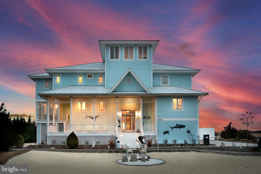 Soak up the sun with this beach house paradise located on 1.3 acres on the Delaware Bay.  Your waterfront dreams await you here in the premier, gated waterfront community of Back Bay Cove.  This global luxury home boasts over 6600+ square feet that allows plenty of space for entertaining guests.  Custom built with attention to detail this home takes advantage of full panoramic views of the Delaware Beaches and Prime Hook Wildlife Refuge setting the stage for a front row seat to breathtaking sunrises and sunsets.  Cooking enthusiasts will fall in love with this large gourmet kitchen featuring solid wood cabinets, Corian countertops, Subzero Fridge, Trash Compactor, wall oven with warming drawer, and Jenn Aire flat top for cooking with a grilling area that overlooks the Delaware Bay.   For convenience and added accessibility this home offers an Elevator that opens at all 4 floors of this home.   Primary Suite features waterfront views, deck, and a large custom walk in closet. The primary bath features custom tile, vanity area, double sinks, higher counter tops, tile shower, dedicated primary bath laundry space, and toilet area with bidet. Extra features of this home include additional space that can be used for guests or as an office, metal roof, beautifully designed paver driveway, 2 new heating units, central vacuum, screened porch, decks, security system, built ins cabinets with lighting, 2 gas stone fireplaces, hardwood, marble, and ceramic tile flooring. Ample Storage throughout home with extra storage closet and 4+ car garage with built in cabinetry. Enjoy inground pool with privacy fence, outside shower, and 4th floor lookout features hot tub and bar area. Great location in a truly one-of-a-kind private beach front community! Whether you are looking for a beach home or primary residence this home is ready for your fun in the sun! Contact agent for more information.