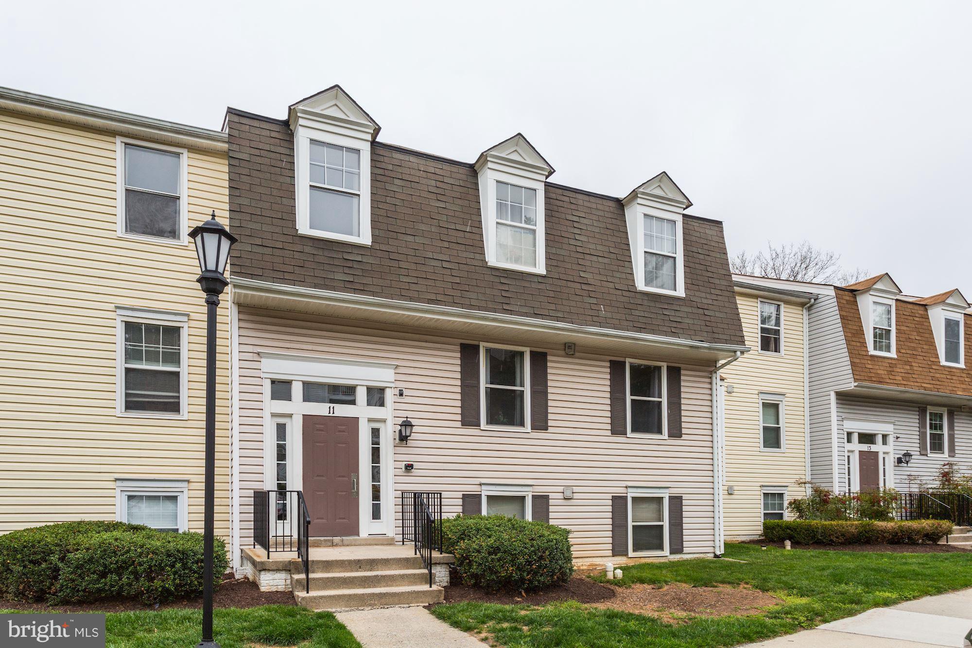 Great opportunity to own beautiful, contemporary garden style condo. Home offers 2 bedrooms/2 bathrooms, crown molding, wood laminate fls, LR w/marble profile fireplace. Washer/dryer in unit. Modern kit nicely updated with elevated breakfast bar. Private balcony w/tree views. Plenty of parking, comm. pool, playground & clubhouse. Close to I-270, shopping, dining & commuter routes. Move-in ready!