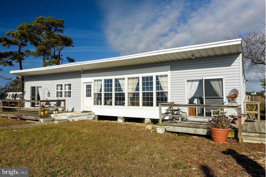 Looking for a quiet getaway with room for the whole family.  Here it is. Breathtaking views across the bay, and wonderful sandy beaches to relax on. Quiet dead end street with just a few homes.  The fishing is fantastic and the peace and quiet is even better.  Home has been partially restored, but needs a little TLC.  This is a great getaway form the hustle and bustle!!