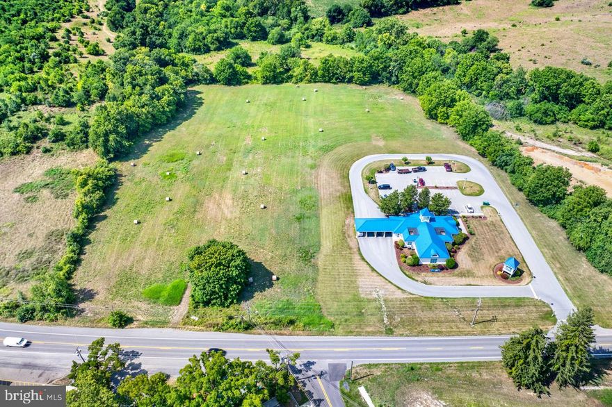 Unlock the potential of your business with this exceptional 6.33-acre commercial land lot in the heart of Charles Town, West Virginia. Strategically located with easy access to Route 340, this prime property offers unparalleled visibility and convenience, making it an ideal investment for a wide range of commercial ventures.

This versatile and open land is zoned for commercial use, suitable for a variety of business applications. Its central location in Charles Town ensures high visibility and exposure, with a high traffic count that guarantees excellent exposure for your business. The convenient access to Route 340, a major thoroughfare, adds to its appeal, making it perfect for retail, office space, hospitality, or mixed-use development.

Seize this unique opportunity to establish your business in a thriving area with robust growth potential. Whether you're looking to expand your current operations or embark on a new venture, this property offers the perfect canvas to realize your vision.